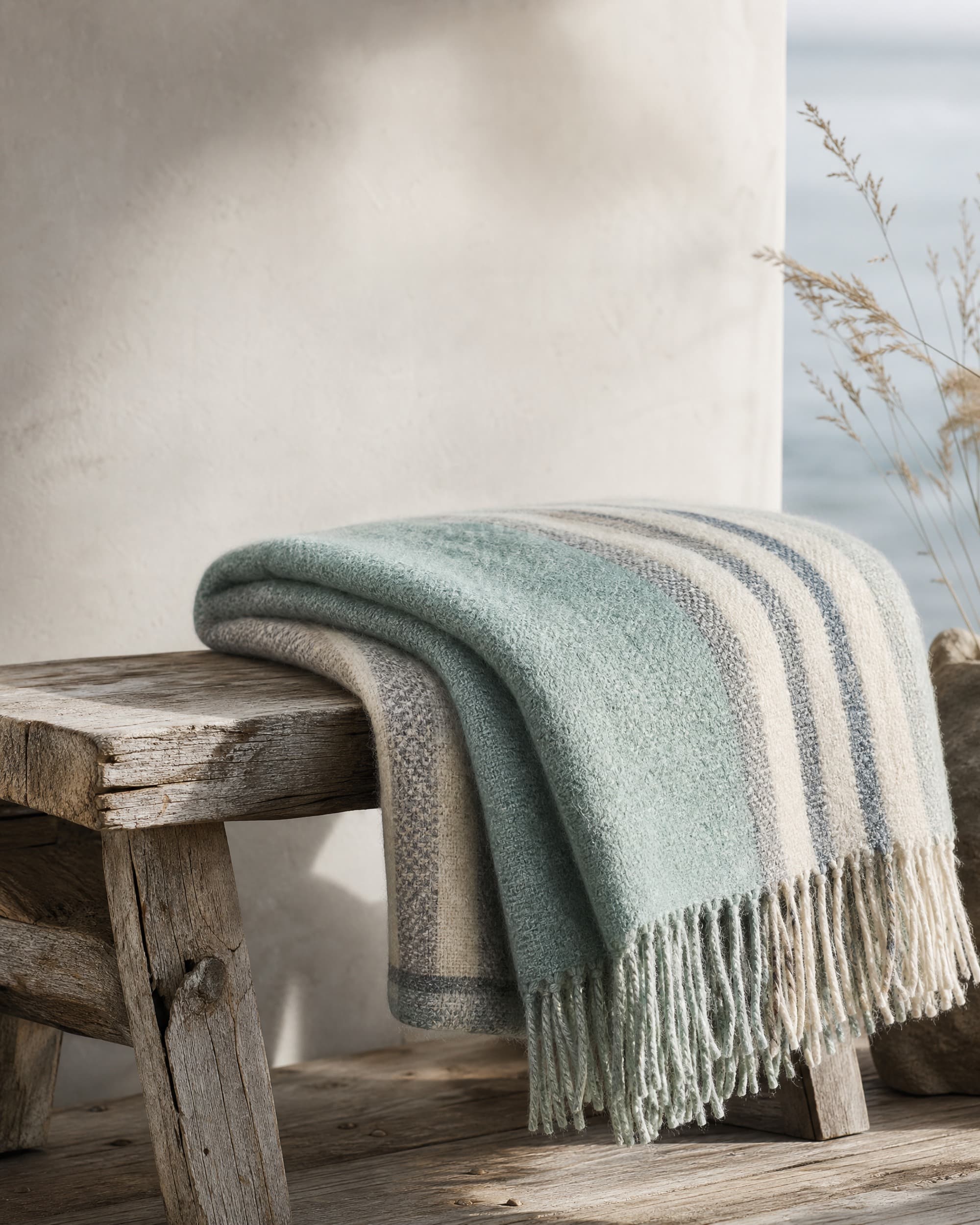 Example product artwork for the fictional Sample product Driftwood Wool Throw.